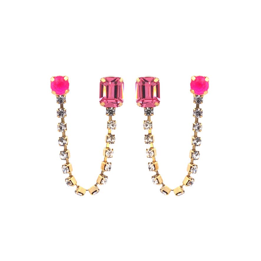 Pair of earrings with pink gemstones and gold accents on a white background