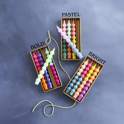 Colorful abacus beads in three categories labeled 'Bold', 'Pastel', and 'Bright' on a gray background.