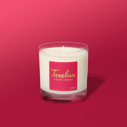 Truelux lotion candle on a red background