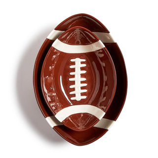 Football-shaped ceramic plate on a white background