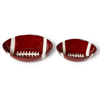 Two football-shaped bowls on a white background
