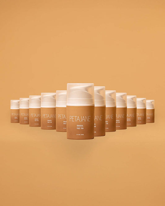 Row of Peta Jane sunless tanning products on a matching brown background