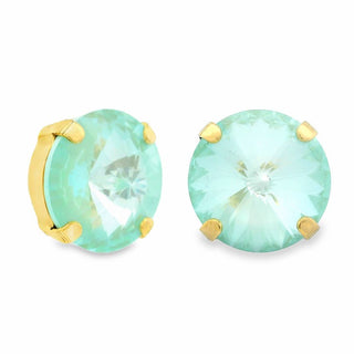 Pair of turquoise earrings with gold accents on a white background