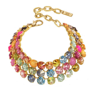 Multicolored gemstone bracelet with gold chain on a white background