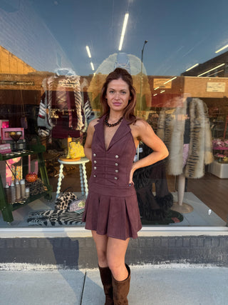 Vegan suede mini dress in maroon with a halter plunging V-neck and pleated skirt.