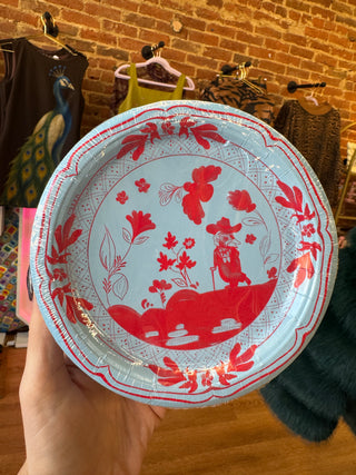 Blue and red dinner sized paper plates with colonel Reb printed on them 