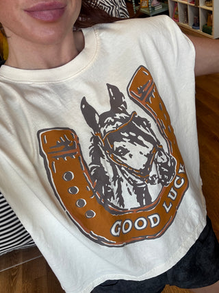Woman wearing Good Luck Pony western horse graphic boxy muscle tank
