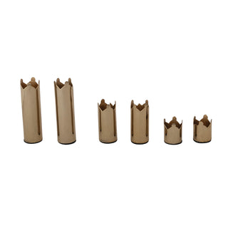 Six metallic gold crown-shaped ring stands arranged in descending size on a plain white background.