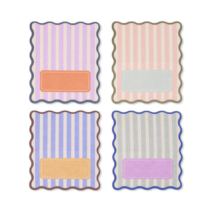 Four striped name tags with different color schemes on a white background