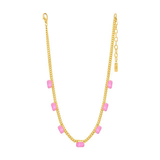 A gold chain necklace featuring multiple rectangular pink gemstone accents spaced along the chain, shown against a plain white background.