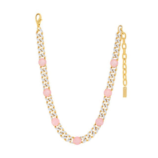 A gold-toned chain necklace featuring alternating round pink gemstone accents and a gold lobster clasp, displayed on a clean white background.