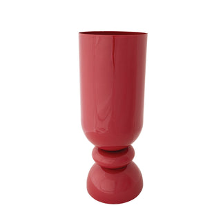 Red cylindrical vase with a wider base on a white background