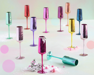 A collection of 10.25-inch reflective flutes in various bright colors, set on a pastel background.