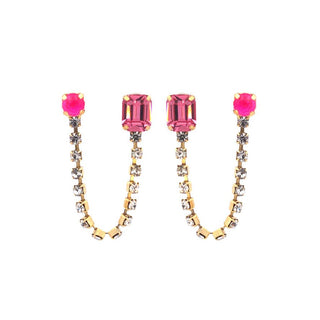 Pair of earrings with pink gemstones and gold accents on a white background