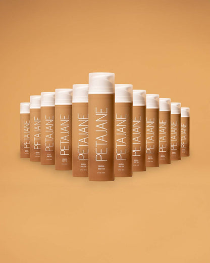 Row of Petal Jane hair care products on a matching brown background