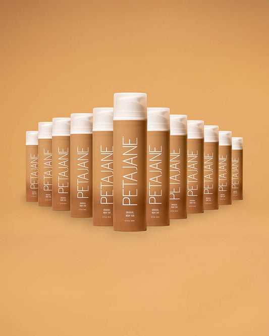 Row of Petal Jane hair care products on a matching brown background