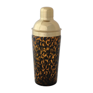 Cocktail shaker with gold top and leopard print body on a white background