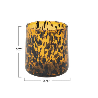 Tortoiseshell patterned glass candle holder with dimensions on a white background